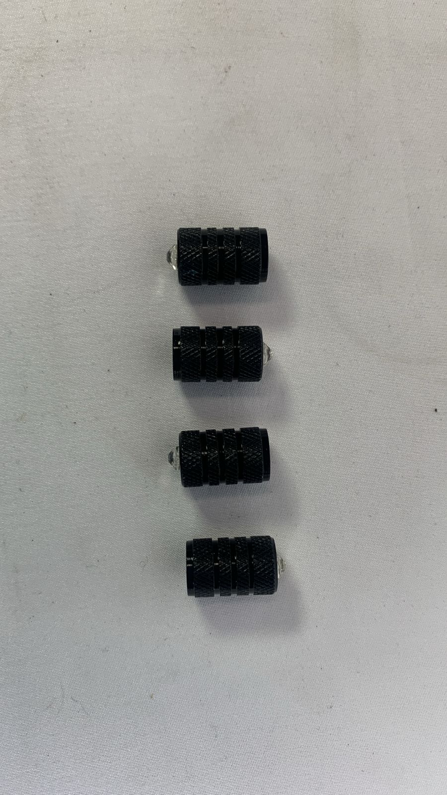 The black valve caps