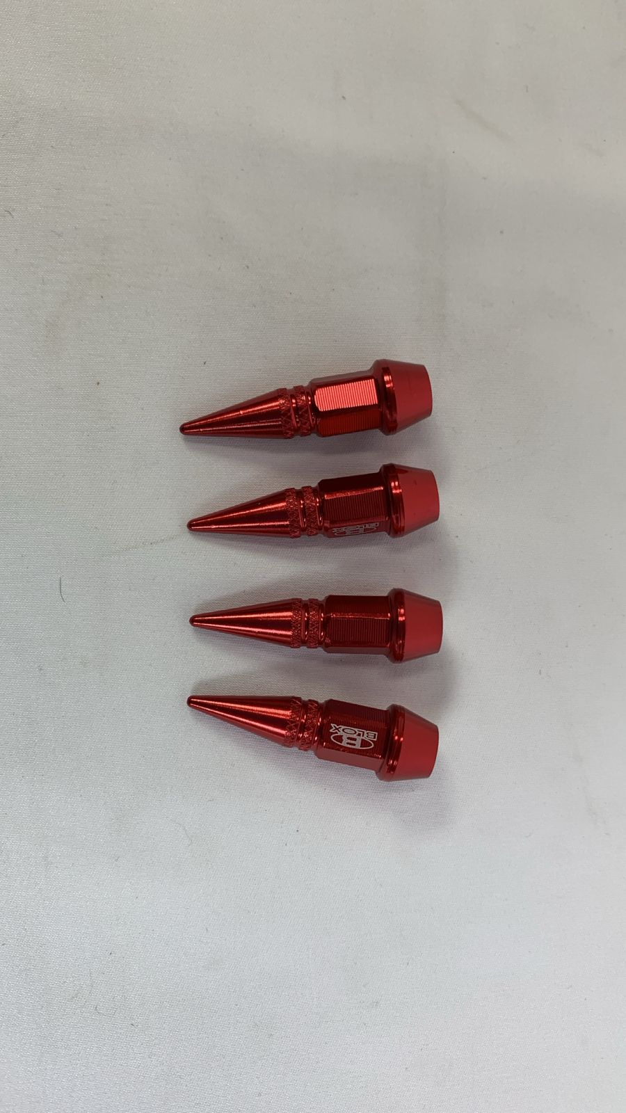 Spike valve caps red