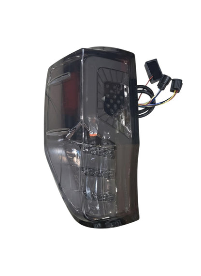 My Store Ford Ranger T6 T7 T8 2012+ LED tail light with smoke lens and integrated brake, indicator, and reverse lights.